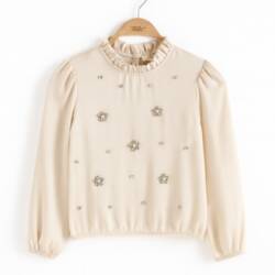 Meisjes blouse met bloem strass in beige verkrijgbaar in wit met ruches aan de kraag Meisjes blouse met bloem strass in beige, verkrijgbaar in wit, met ruches aan de kraag