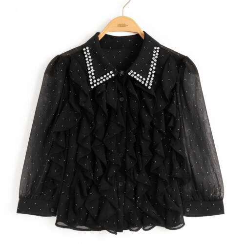 Meisjes blouse zwart met ruffles en strass, transparante mouwen en kraag met steentjes