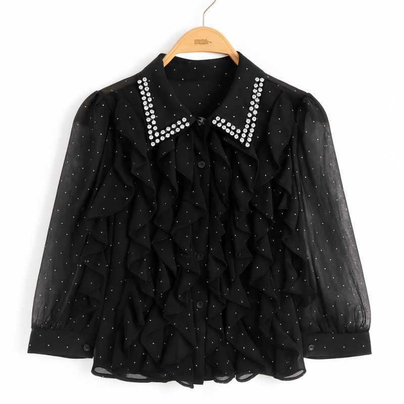 Meisjes blouse zwart met ruffles en strass, transparante mouwen en kraag met steentjes