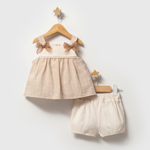 zomerset beige meisje Nipperland met strikjes top en short