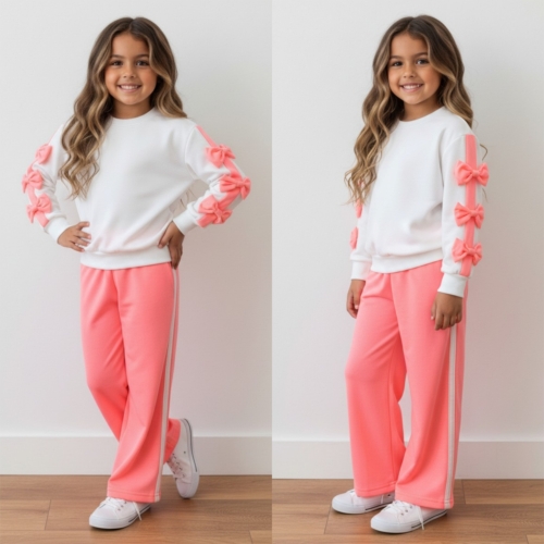 meisjes joggingpak wit perzik strikjes