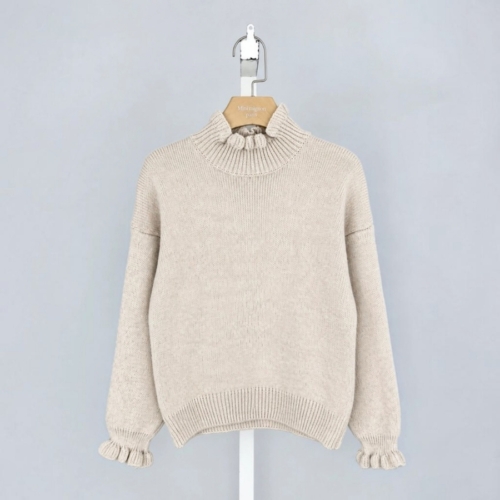 beige meisjes coltrui met roesjes